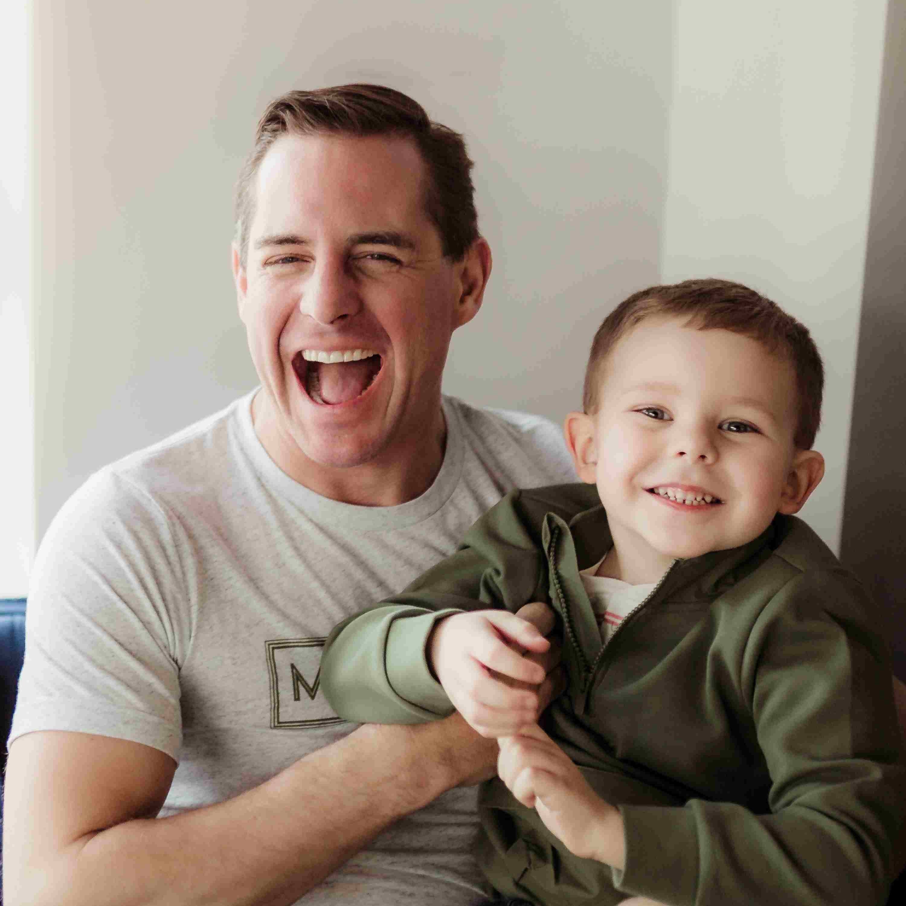 Joe Piercy holding his youngest son